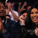 A happy looking couple, looking loved up