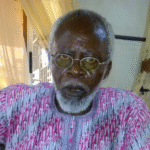 elderly looking male with white beards