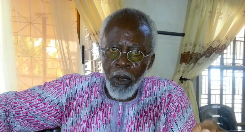 elderly looking male with white beards