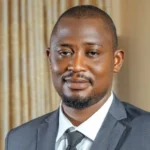 African male dressed in a suit