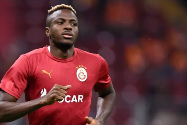 A male African footballer on the pitch