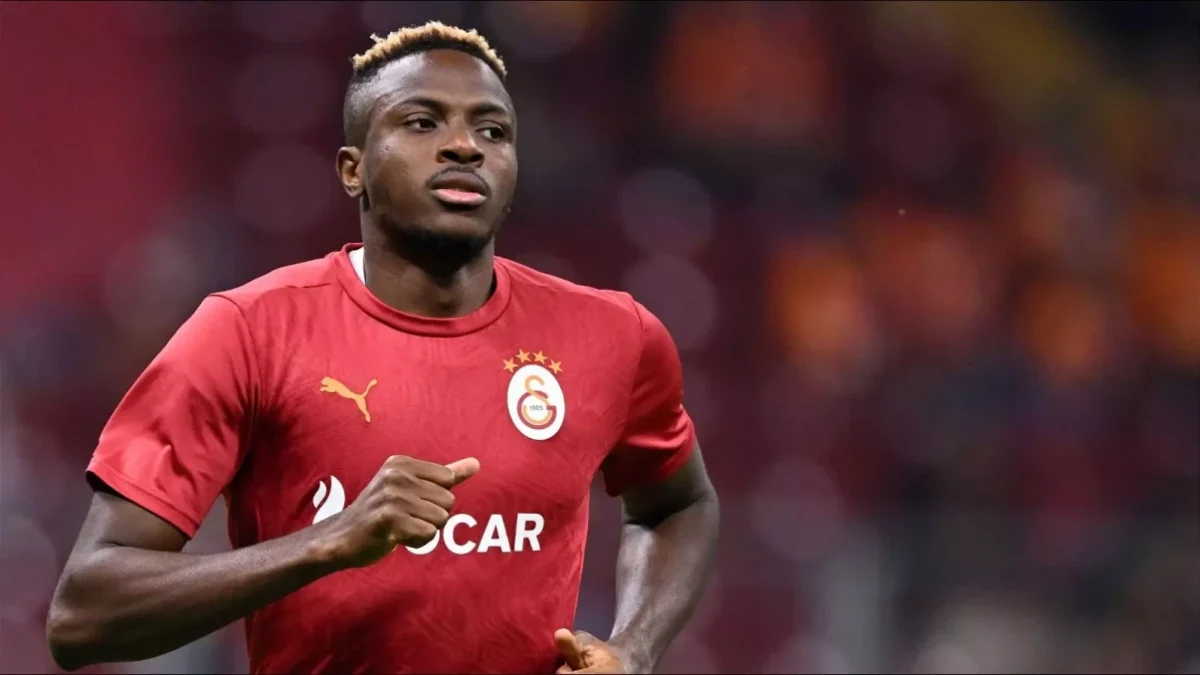 A male African footballer on the pitch