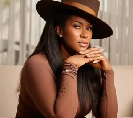 Beautiful African lady dressed with a hat on