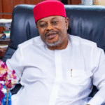 Nigerian Senator pictured smiling in an African attire