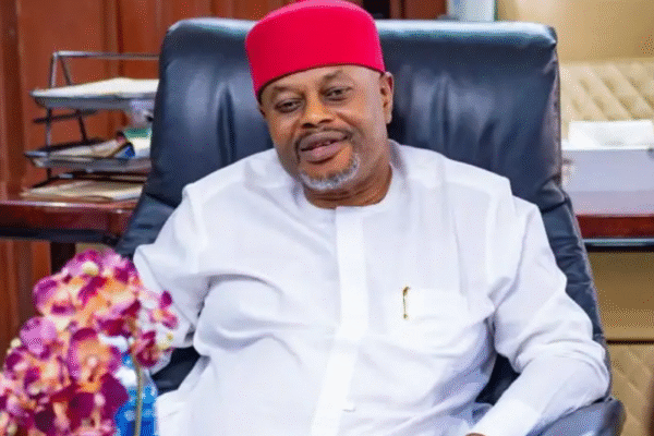 Nigerian Senator pictured smiling in an African attire