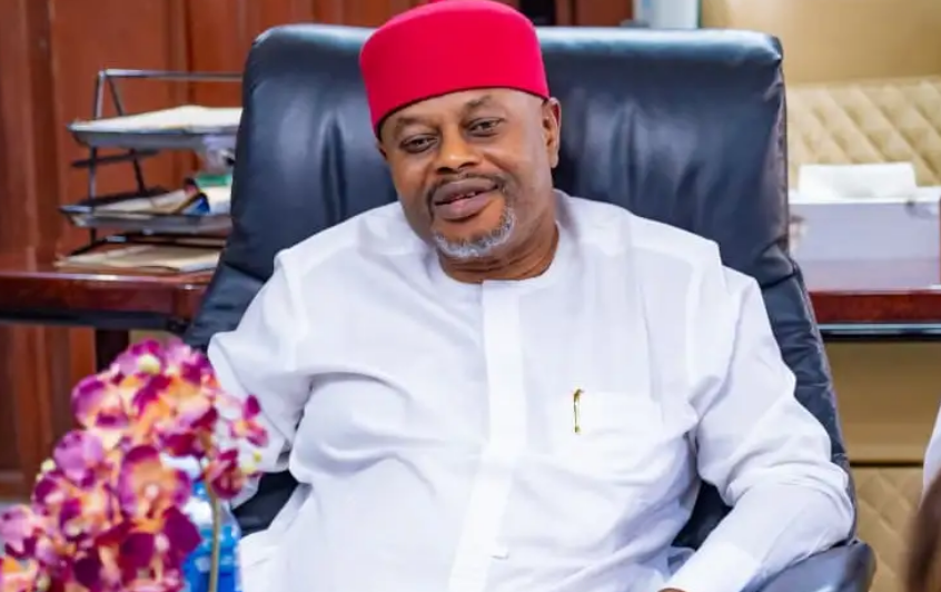Nigerian Senator pictured smiling in an African attire