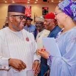 Male and a female speaking to each other