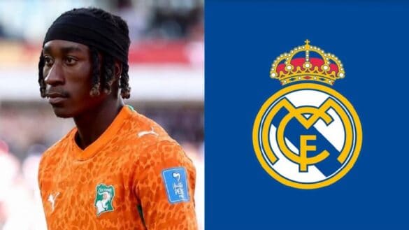 male footballer with a logo of Real Madrid
